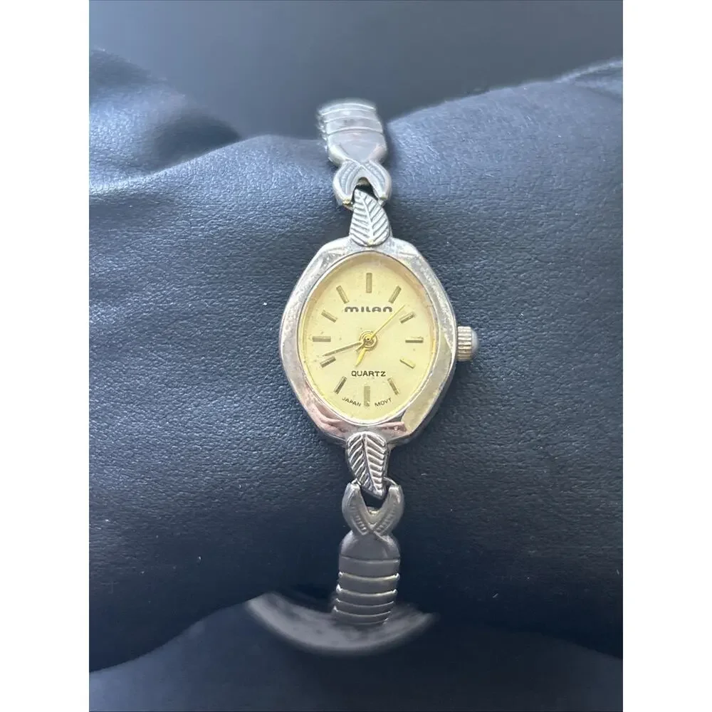 Milan Silver Tone Case Gold Tone Dial Women’s Stretch Band Quartz Watch